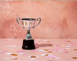 Trophy on pink background 