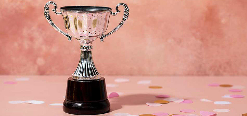 Trophy on pink background 